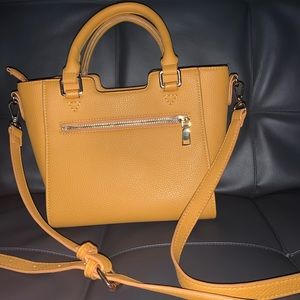 A mustard yellow purse